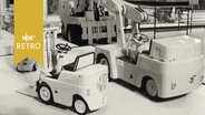 Modelle von Gabelstaplern und Kranwagen auf der Hannover-Messe 1964  