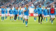 Rostocks Spieler sind enttäuscht © IMAGO / Jan Huebner 