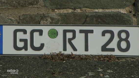 Eine Autokennzeichen mit: GC-RT-28.  