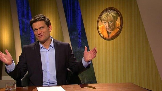 Der Moderator Christian Ehring.  