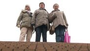 Drei Damen mit treppe  
