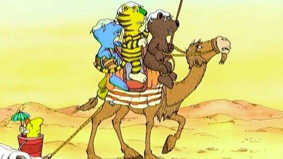 Schlüter, Antje, Tiger und Bär kommen auf ihrem Ritt durch die Wüste ganz schön ins Schwitzen. © NDR/Papa Löwe Filmprod. 