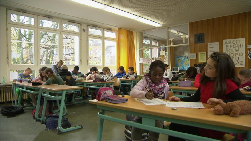 Schule windeln in der Schweiz: Lehrerin