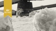 Vereiste Elbe mit großen Schollen an den Elbbrücken 1963.  