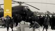 Bundeswehrhubschrauber zur Versorgung der Bevölkerung auf Norderney 1963.  