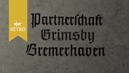 Schriftzug: "Partnerschaft Grimsby Bremerhaven 1963"  