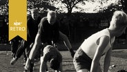 Jungendliche beim Bockspringen beim Jugendsporttreffen in Hannover 1962  