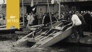 Beim Segelclub "Hansa" in Lübeck wird ein Katamaran zu Wasser gelassen (1965)  