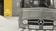 Störungswagen in Kiel auf einem Parkplatz mit Schneehaufen (1963)  