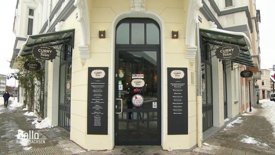 Der Eingang eines Restaurants.  