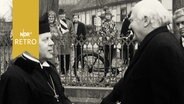 Landesbischof Hanns Lilje begrüßt den Erzbischof von Canterbury, Arthur Ramsey (1964)  