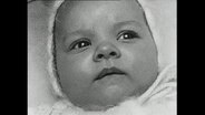 Eine Nahaufnahme von dem Gesicht eines Babys (Archivbild)  