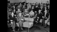 Publikum einer Diskussionsrunde.  