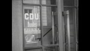 Glastür mit der Aufschrift: CDU-Bundesgeschäftsstelle.  