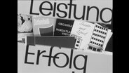 Broschüren mit der Aufschrift "Leistung und Erfolg" "Stadt und Land" "Sicherheit"  