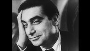 Der Kriegsfotograf Robert Capa im Porträt.  
