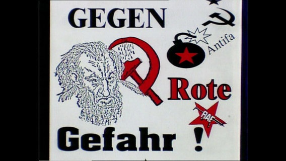 Ein Sticker der gegen die rote Gefahr von Links aufruft  