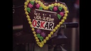 Ein Lebkuchenherz mit dem Schriftzug "Ich liebe Oskar (Lafontaine)"  
