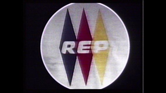 Die Buchstaben "REP" auf einer schwarzen, roten und gelben Raute, das Logo der Republikaner (Archivbild).  