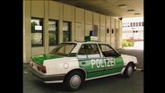 Ein parkendes Polizeiauto (Archivbild).  