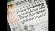 Die Titelseite der Bild-Zeitung mit der Aufschrift "Alarm für Stuttgart: Drei Bomben gehen hoch!" (Archivbild).  
