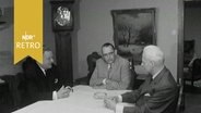 Finanzminister Dahlgrün, Bürgermeister Engelhard und Reeder Meier-Hedde an einem Tisch im Gespräch (1965)  