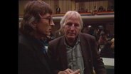 Zwei Männer auf dem APO-Treffen (Archivbild).  