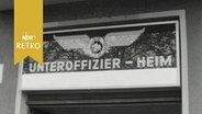 Schriftzug "Unteroffizier-Heim" unter einem Adlersymbol der Bundesluftwaffe (1964)  