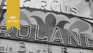 Schild über dem Manegeneingang "Circus Roland mit Busch Berlin" (1964)  