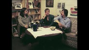 Schriftsteller Fuchs, Lyriker Matthies und Musiker Biermann an einem Tisch (Archivbild)  