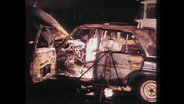 Die Überreste eines explodierten Autos  