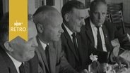 Vier ältere Herren bei einer Vorstandssitzung des Bund Deutscher Nordschleswiger 1965  