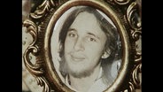 Ein eingerahmtes Foto von Ulrich Schmücker  