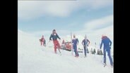 Skifahrer auf einer Skipiste  