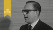 Wolfsburgs Stadtbaurat Rüdiger Recknagel bei einem Vortrag 1963  