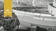 Bug der Fähre "Prins Bertil", umringt von zahlreichen Gästen beim Stapellauf von der Nobiskrugwerft in Rendsburg 1964  
