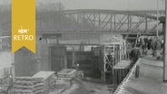 Arbeiter an der leeren Berkenthiner Schleuse bei Renovierung 1964  