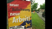CDU-Wahlplakat mit der Aufschrift "Aufschwung, neue Arbeit"  