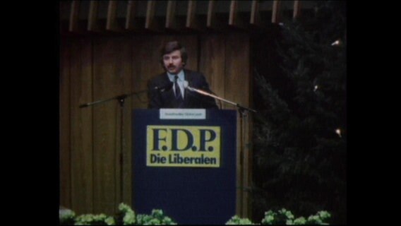 Jürgen Möllemann an einem FDP-Rednerpult  
