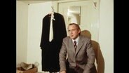 Ein Richter in seinem beengten Büro  