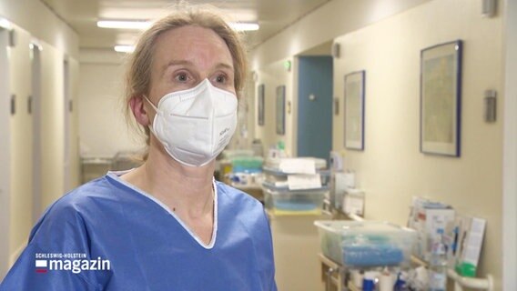 Eine Krankenpflegerin mit Maske. © Screenshot 