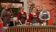 The Golnik family at a cooking duel.  ©screen shot 