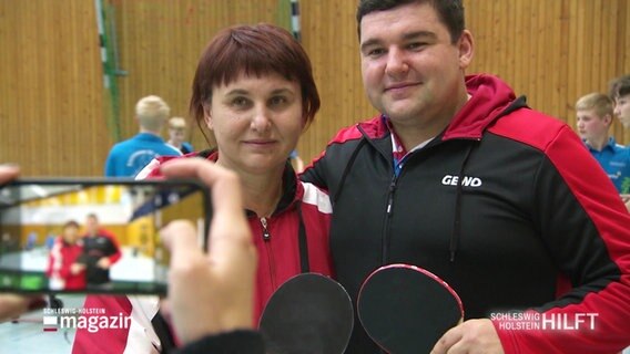 Dmytro Asieiev is photographed with his mother.  © screenshot 