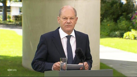 Bundeskanzler Olaf Scholz bei einer Pressekonferenz. © Screenshot 