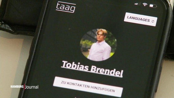 Eine digitale Visitenkarte auf dem Display eines Smartphones © Screenshot 