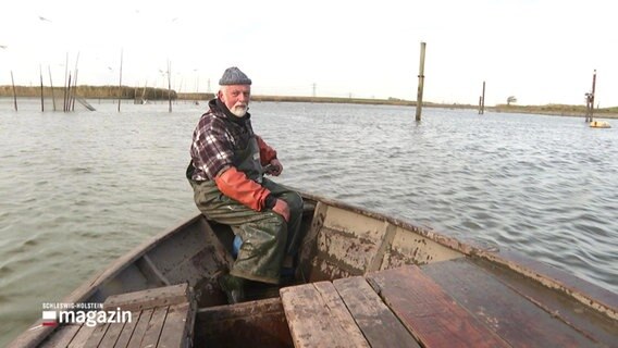 Eider-Fischer auf einem Boot. © Screenshot 