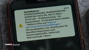 Probewarnmeldung als Push-Nachricht auf einem Handy-Display. © Screenshot 
