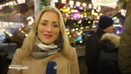 Reporterin Lisa Knittel berichtet vom Weihnachtsmarkt in Neumünster. © Screenshot 