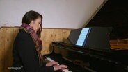 Olena Radiyevska am Klavier. © Screenshot 