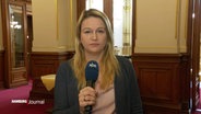 Reporterin Ines Jacobi berichtet live aus dem Hamburger Rathaus. © Screenshot 